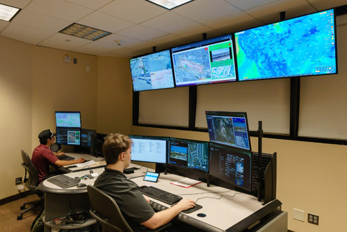 BNSF drone pilots Lorenzo Gomez, left, and Matthew Powell work in the new Flight Operations Center. BNSF drone pilots Lorenzo Gomez, left, and Matthew Powell work in the new Flight Operations Center.