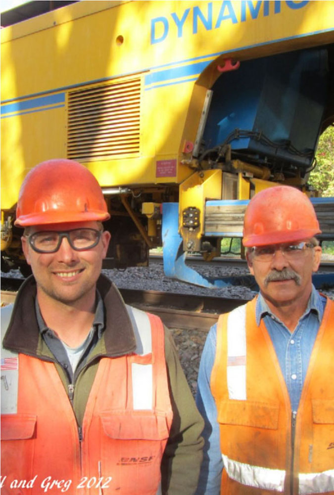 Bill and Greg Hampson working together during Greg’s last year of service